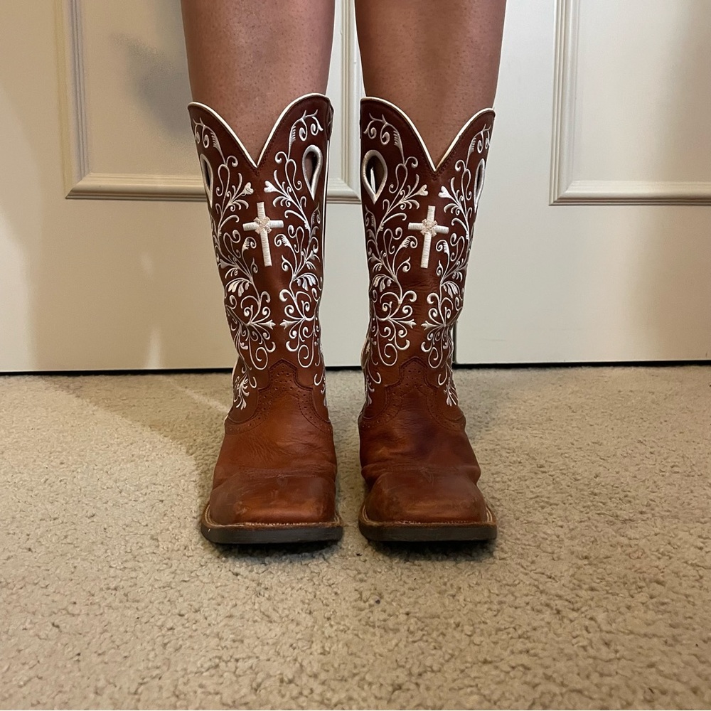 Cowgirl boots with white stitched cross